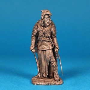 Tin miniature, figurine of Dacian warrior ready for battle, 2nd century AD. Metal Figure a Dacian warrior. Scale 1:32, tin 54mm.