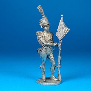 Tin miniature, figurine of French Sergeant of the Carabiniers of the 8th Light Regiment With a Company Fannon, 1809. Scale 1:32, tin 54mm.