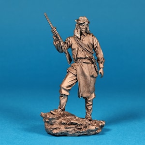 Tin miniature, figurine of Apache Indian. Metal Figure a Apache Indian. Scale 1:32, tin 54mm.