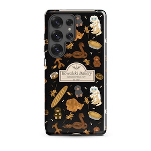 May include: Black phone case featuring a repeating pattern of baked goods, teddy bears, and whimsical creatures. The case includes the text "Kowalski Bakery Manhattan, NY Est. 1927". The design incorporates elements of a bakery theme.