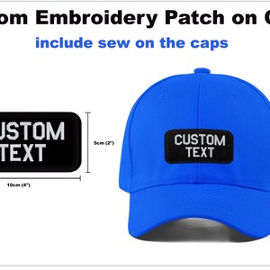 May include: A blue baseball cap with a black embroidered patch that says "CUSTOM TEXT". The patch is 10 cm wide and 5 cm tall.