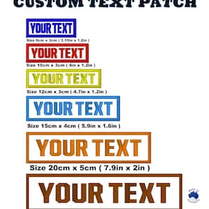 May include: Five embroidered patches with the text "YOUR TEXT" in different sizes and colours. The patches are blue, red, yellow, light blue, and orange. The patches are made in Australia.