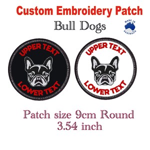 May include: Two round embroidered patches featuring a black and white bulldog with the text "UPPER TEXT" and "LOWER TEXT" in red. The patches are 3.54 inches in diameter and are available in black and white.