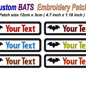May include: Custom embroidered patches featuring a bat design and the text "Your Text" in different colours. Each patch measures 12cm x 3cm. The patches are black with a white border and are made in Australia.