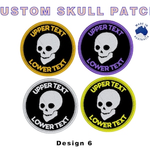 May include: Four custom skull patches with the text "UPPER TEXT" and "LOWER TEXT" surrounding a skull design. The patches are round with black centers and different colored borders: gold, purple, white, and yellow. The text "Design 6" is at the bottom.