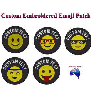 May include: Six embroidered iron-on patches featuring different emoji faces with the text "CUSTOM TEXT" around each. The emojis include a smiley face, a smiley face with glasses, a smiley face with sunglasses, a smiley face with a halo, and a smiley face with a tongue sticking out. The patches are made in Australia.