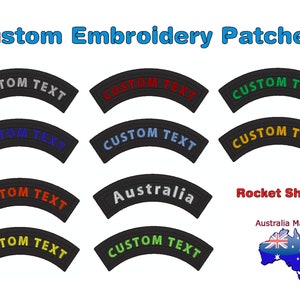 May include: Twelve black embroidered patches in a rocket shape with various coloured text. The text on the patches says "CUSTOM TEXT" in red, blue, green, yellow, and white. One patch says "Australia". The text "Rocket Shape" and "Australia Made" are also visible. The image shows a small Australian flag.