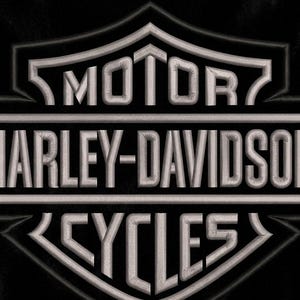 Black leather jacket embroidery design with motorcycle themed emblem.