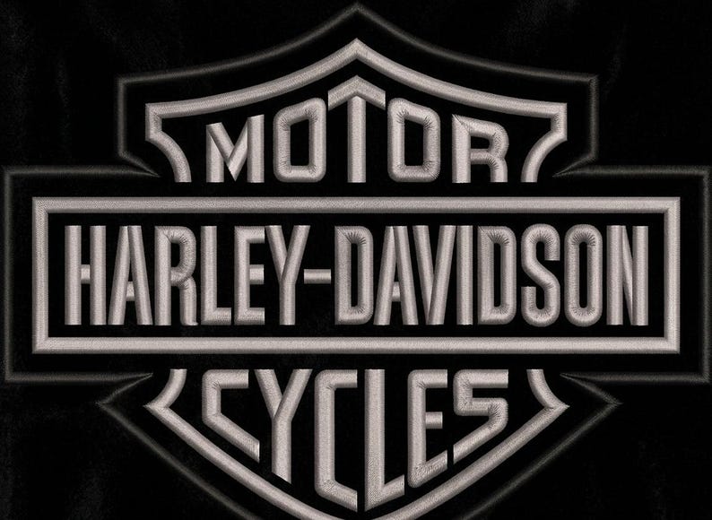 Black leather jacket embroidery design with motorcycle themed emblem.