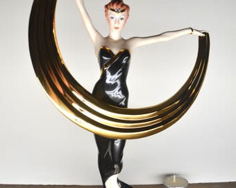 Porslinsfigur "Promise of Gold" från Franklin Mint