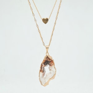Geode slice layered necklace with heart pendant