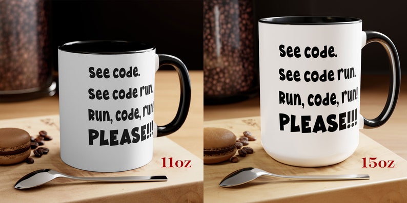 May include: Two white ceramic mugs with black rims and handles are displayed. The mugs have the text "See code. See code run. Run, code, run! PLEASE!!!" in black. One mug is labeled 11oz, the other 15oz. A spoon and a macaron are in the foreground.