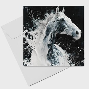 May include: Greeting card depicting a white horse with a flowing mane and body, set against a black backdrop. The horse seems to be emerging from a splash of white liquid, creating a dynamic and artistic effect. The card is white with a matching envelope.