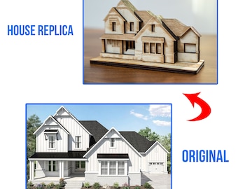 May include: A wooden model of a white farmhouse with black trim and a black roof. The model is a replica of a larger house, and is shown next to a photo of the original house.