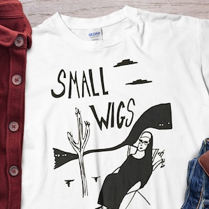 Small Wigs Desert Nun tshirt Unholy Nun Shirt Unisex T-Shirt