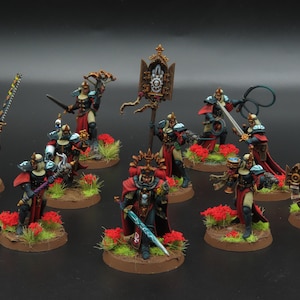 Equipo de exterminio de novicios pintados profesionales. Adepta Sororitas.