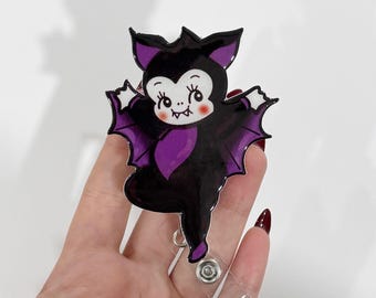 Purple Kewpie Baby Bat badge reel: Spooky Halloween Style