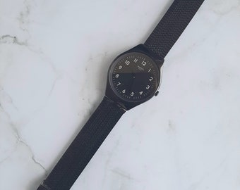 Buy Swatch Skincoal SYXB100GG Online in India