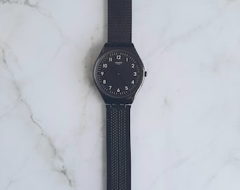 Swatch Skincoal SYXB100GG