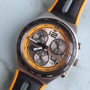 Swatch - Laser Light Irony YCS503 Chronograph 