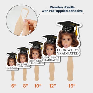 May include: Graduation photo props with a child's face wearing a graduation cap and the year 2026. The props are available in 6", 8", 10", 12", and 16" sizes, with the text "LOOK WHO'S GRADUATED" on each.