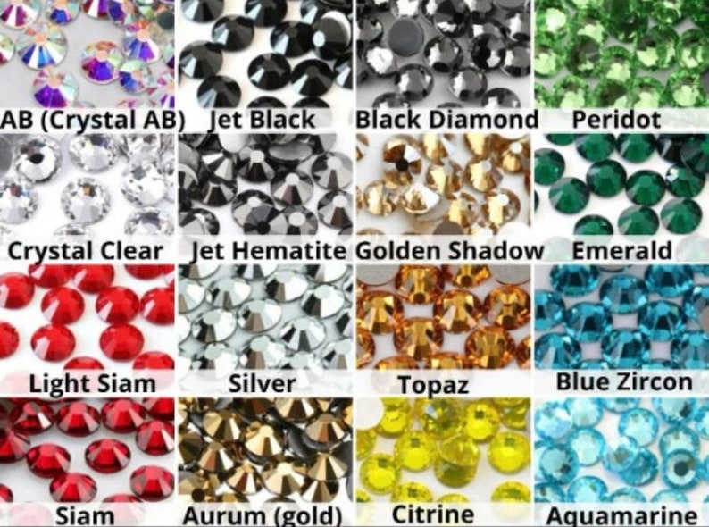 May include: Assortment of rhinestones in various colors, including AB (Crystal AB), Jet Black, Black Diamond, Peridot, Crystal Clear, Jet Hematite, Golden Shadow, Emerald, Light Siam, Silver, Topaz, Blue Zircon, Siam, Aurum (gold), Citrine, and Aquamarine.