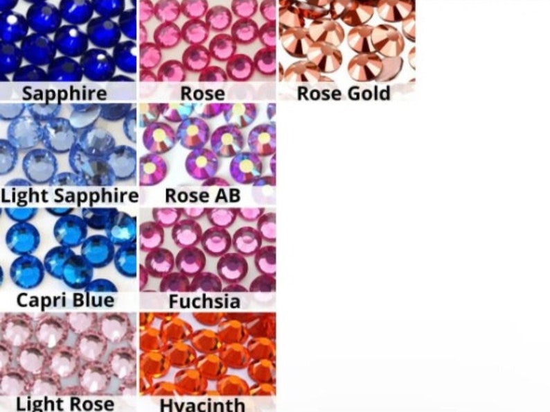 May include: A chart showing different colors of rhinestones. The colors are: Sapphire, Rose, Rose Gold, Light Sapphire, Rose AB, Capri Blue, Fuchsia, Light Rose, and Hyacinth.