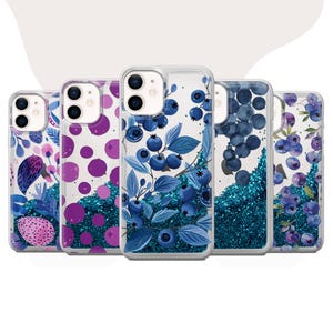 May include: Set of six phone cases with different designs. Each case features a clear background with glitter and a colourful design. The designs include blueberries, polka dots, and a floral pattern.