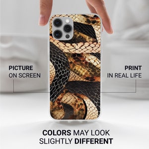 May include: A clear phone case with a snake skin pattern in shades of brown, black, and gold. The case is designed for an iPhone with a triple camera lens.