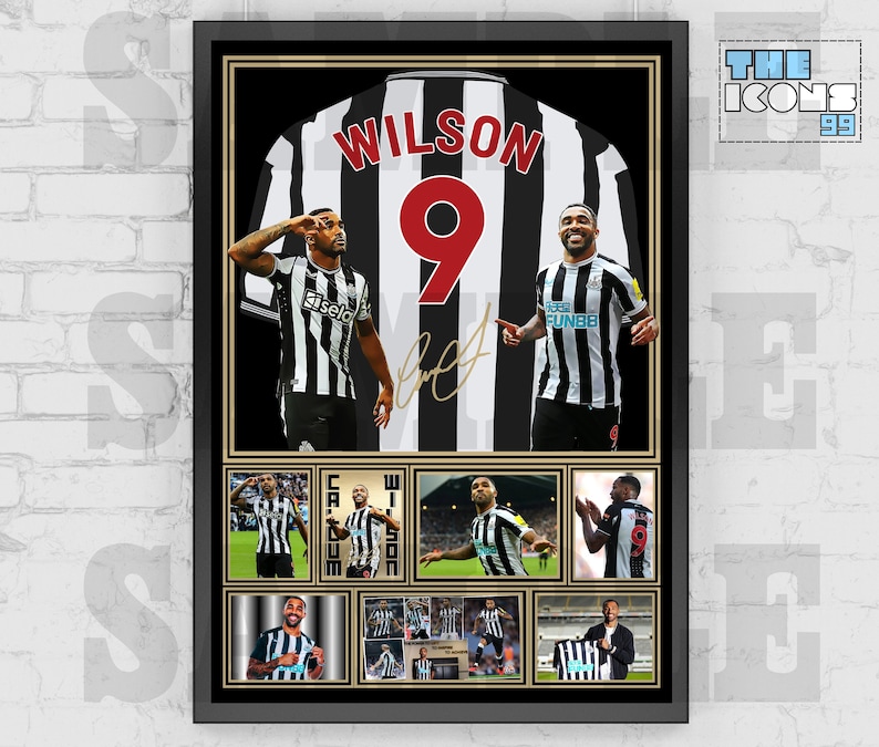 May include: A framed black and white photo of a soccer player wearing a black and white jersey with the number 9 and the name "Wilson" on the back. The photo is surrounded by a black frame with a gold border. The photo includes multiple images of the player in different poses.