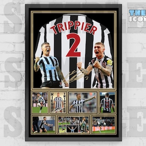 May include: A framed black and white photo of a soccer jersey with the name "Trippier" and the number "2" on the back. The jersey is surrounded by smaller photos of soccer players in action.