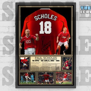 May include: A framed print of a red soccer jersey with the name "SCHOLES" and the number "18" on the back. The jersey is signed by Paul Scholes. The print also includes a photo of Scholes in action, as well as statistics about his career. The print is titled "Paul Scholes 718 Apps - 155 Goals | 1993 - 2013".