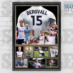 May include: Framed print featuring a soccer jersey with the name "Bergvall" and the number "15". The print includes multiple images of a soccer player, a signature, and a trophy. The background is black.