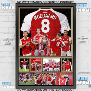 May include: A framed print featuring an Arsenal jersey with "ØDEGAARD 8" on the back, surrounded by images of the player and team. The jersey is red and white, with a large number 8. The print includes the text "THE ICONS".