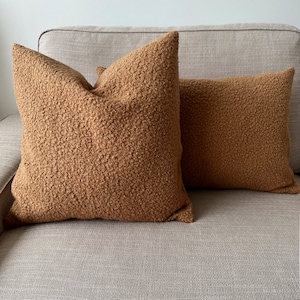 camel color boucle teddy pillow