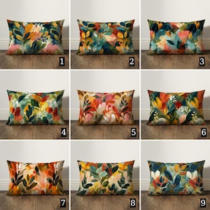 May include: A set of three ceramic mugs with a speckled, matte finish. The mugs are in shades of cream, light brown, and dark brown. Each mug has a simple, minimalist design, perfect for coffee or tea.