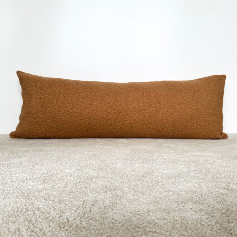 oversized long lumbar pillow. teddy boucle textured. camel color.