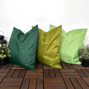 patio pillow covers with green tones