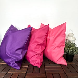 pink and purple color tones of outdoor porch throw pillow cases
