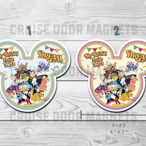 May include: Two Disney Cruise Line themed refrigerator magnets shaped like Mickey Mouse ears. The magnets are blue and pink with a rope border. The text on the magnets reads "My Birthday Cruise 2023" and "Dream". The magnets feature a variety of Disney characters including Mickey Mouse, Minnie Mouse, Donald Duck, Goofy, Pluto, and Stitch.