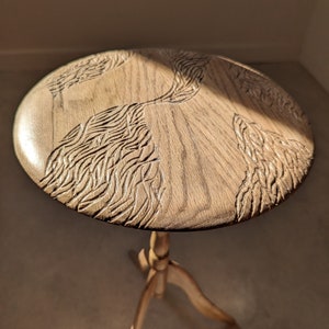 Wooden pedestal table rests upcycling plant