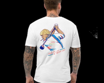 Op de afbeelding: Wit T-shirt met een kleurrijke illustratie van een golfer die een club zwaait. De tekst "GRIP IT & RIP IT" is onder de illustratie gedrukt.