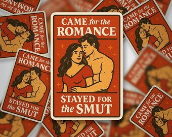 May include: Rectangular sticker with a retro design. The sticker features a couple embracing, with the text "CAME for the ROMANCE" and "STAYED FOR the SMUT" in a vintage font. The background is orange.
