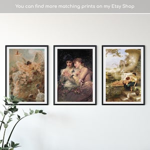May include: Three framed art prints with classical paintings. The artwork features figures in romantic scenes with soft colors and detailed brushstrokes. The frames are black, and the prints are displayed on a white wall.
