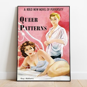 May include: A framed vintage-style poster with a pink background. The poster features the title "Queer Patterns" in bold black letters, with two women in a bedroom setting. The author's name, Kay Addams, is at the bottom. The poster is framed in black.