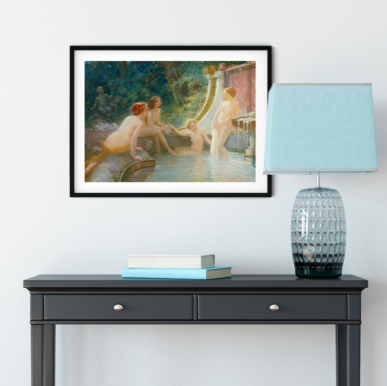 May include: A framed art print depicting a classical scene of nude figures in a water setting. The artwork features a fountain and lush greenery, with soft lighting and a muted color palette.