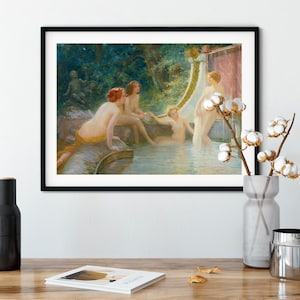May include: Framed art print of a classical painting depicting nude figures in a serene, outdoor setting. The artwork features a water feature, lush greenery, and figures with red hair. The painting is displayed in a black frame.