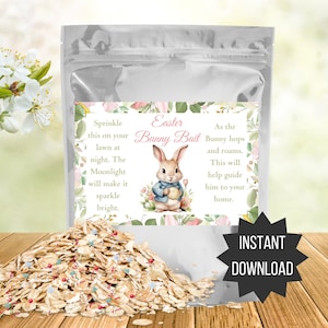 May include: A white bag with a label that says "Easter Bunny Bait". The label has a cartoon bunny holding an egg. The bag contains oats and sprinkles. The text on the label says "Sprinkle this on your lawn at night. The Moonlight will make it sparkle bright. As the Bunny hops and roams. This will help guide him to your home."