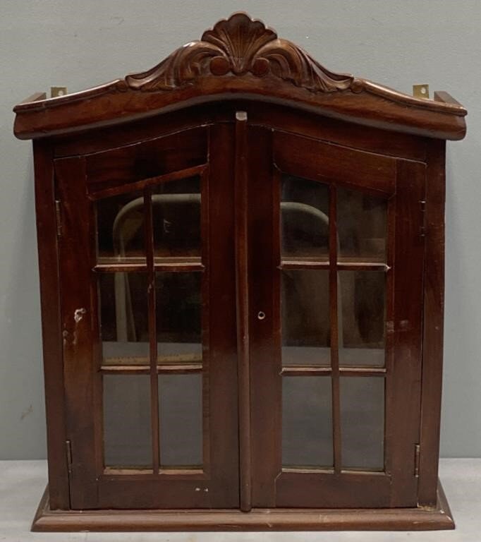 Braeden lighted curio cabinet deals