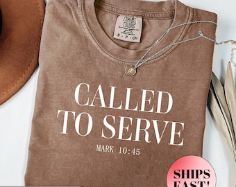 May include: Espresso brown t-shirt with the text "CALLED TO SERVE MARK 10:45" in white. The shirt has a distressed look and is made of a soft, comfortable fabric.
